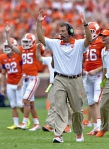 Clemson head coach Dabo Swinney reacts to a touchdown during the first half of an NCAA college football game against Appalachian State, Saturday, Sept. 12, 2015, in Clemson, S.C. (AP Photo/Richard Shiro)