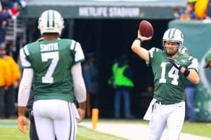 Dec 27, 2015; East Rutherford, NJ, USA; New York Jets quarterback Ryan Fitzpatrick (14) and New York Jets quarterback Geno Smith (7) warmup for their game against the New England Patriots at MetLife Stadium. Mandatory Credit: Ed Mulholland-USA TODAY Sports